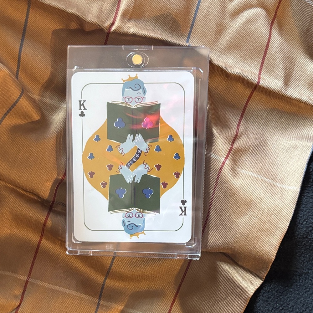 King of Clubs Playing Card in Protective Case